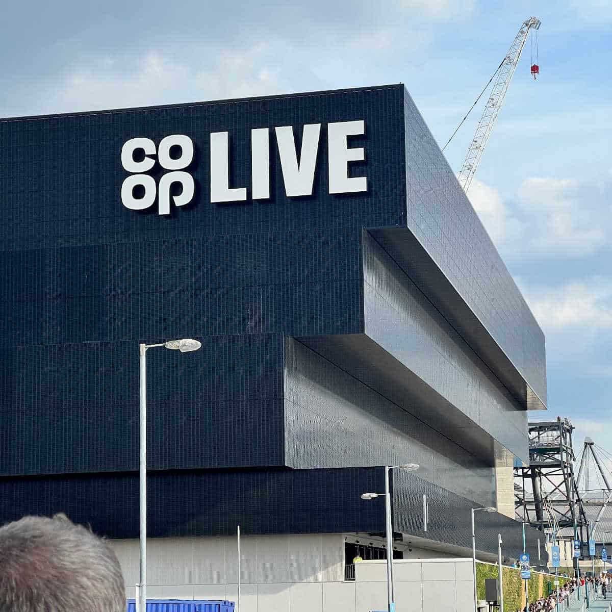 The outside of the Co-Op Live arena music venue in Manchester on a sunny day