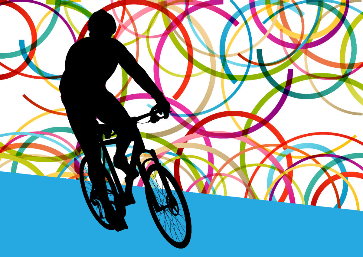 black silhouette of a cyclist with graphics of bright circles behind depicting Ride the Lights at Blackpool